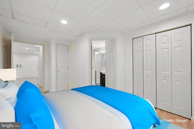 a view of a workspace with furniture and a potted plant