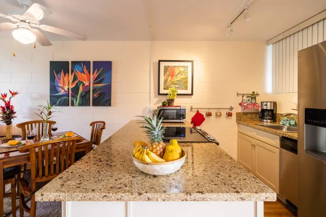 a very nice looking dining room with a table and chairs