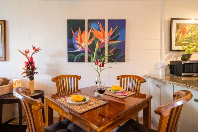 a bedroom with furniture and a chair