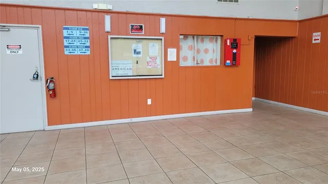 a view of a tree in front of a house