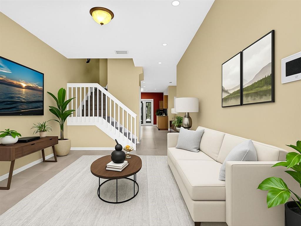 21421 Northwest 13th Court, Unit 211 Miami, FL 33169 - Photo 1 of 18 a living room with furniture and a flat screen tv