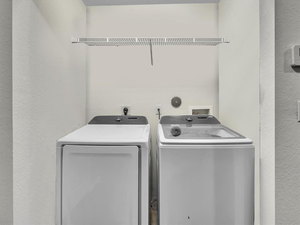 21421 Northwest 13th Court, Unit 211 Miami, FL 33169 - Photo 12 of 18 a utility room with dryer and washer