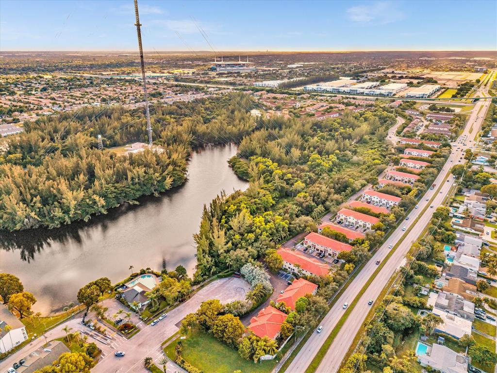21421 Northwest 13th Court, Unit 211 Miami, FL 33169 - Photo 18 of 18 an aerial view of residential houses with outdoor space