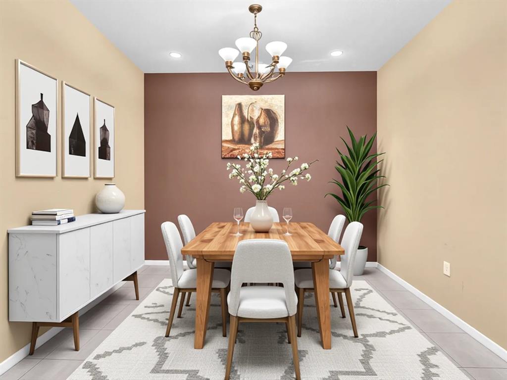 21421 Northwest 13th Court, Unit 211 Miami, FL 33169 - Photo 2 of 18 a dining room with chandelier and wooden floor