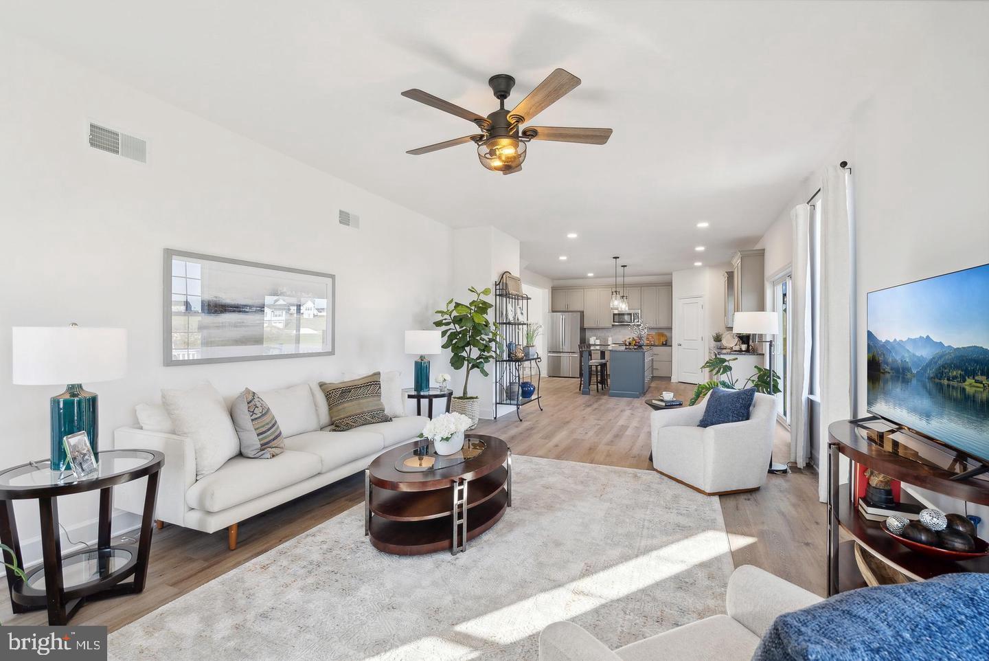 192 Ledger Drive, Unit 72 Hanover, PA 17331 - Photo 6 of 21 a living room with furniture kitchen view and a window