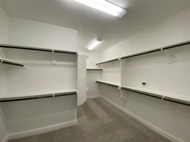 a view of a balcony with wooden floor
