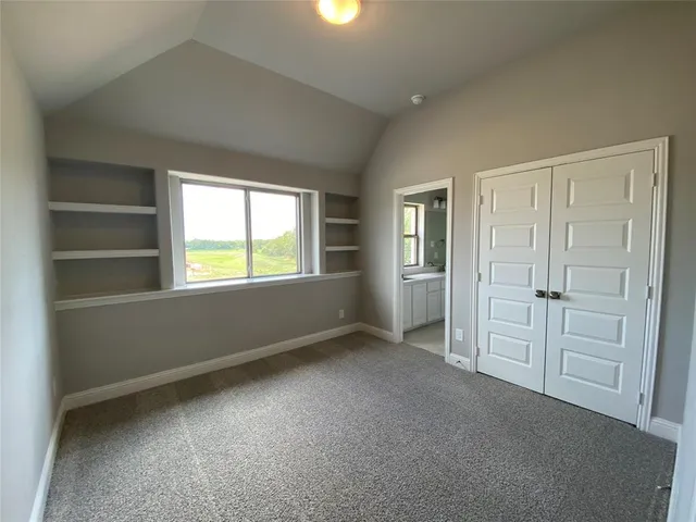 a bathroom with a toilet and a bathtub