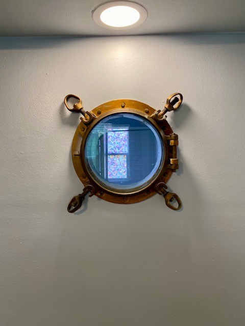 1302 West Pierce Street Houston, TX 77019 - Photo 5 of 12 a bathroom with a sink and a mirror