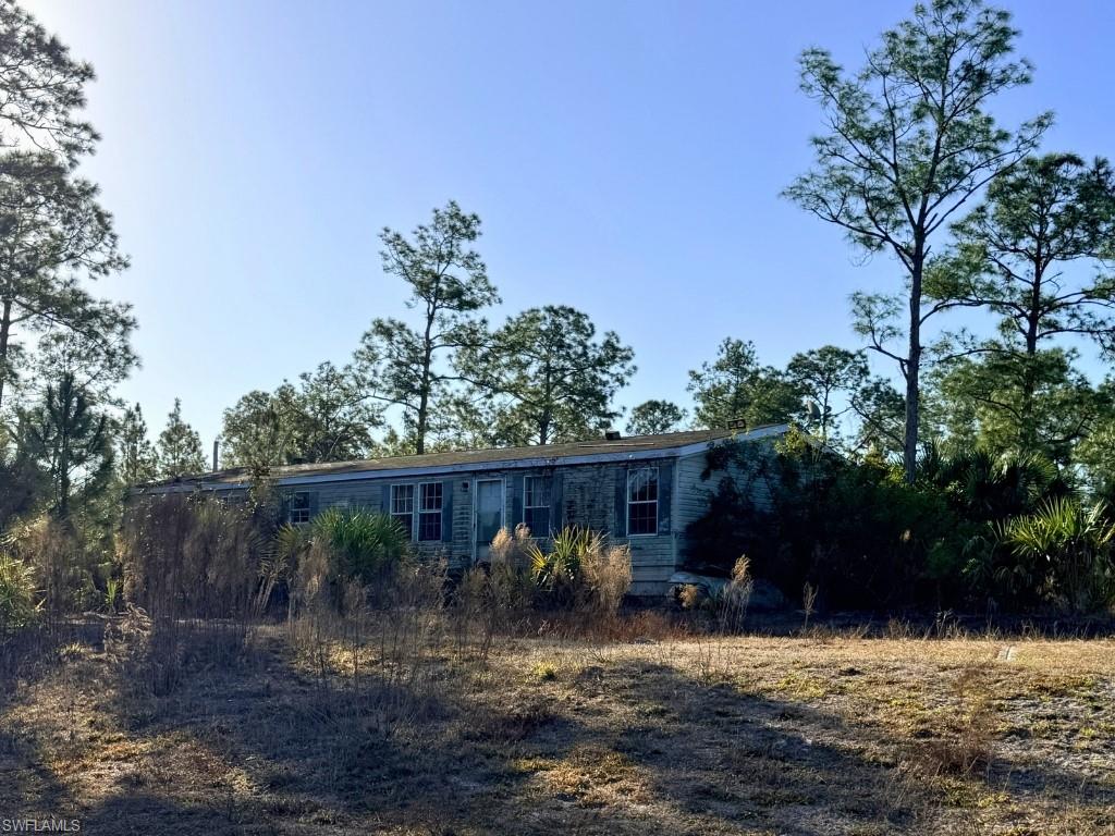 1610 Ivy Way Naples, FL 34117 - Photo 1 of 1 a view of a small yard