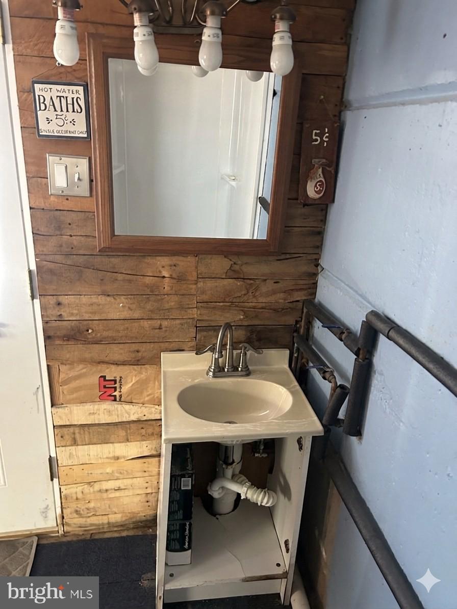 3243 Morrell Avenue Philadelphia, PA 19114 - Photo 13 of 28 a bathroom with a sink and a mirror
