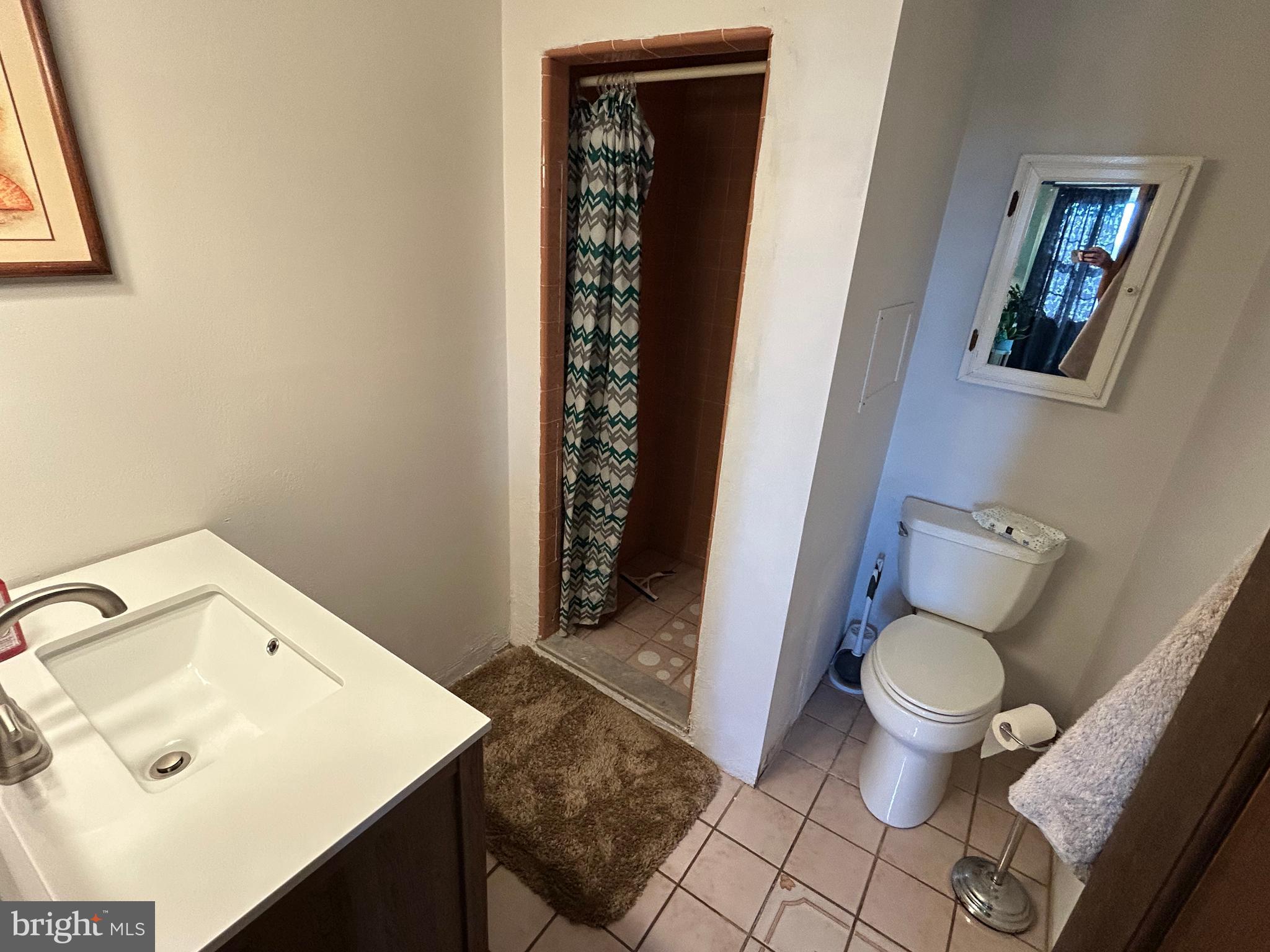 3243 Morrell Avenue Philadelphia, PA 19114 - Photo 19 of 28 a bathroom with a sink and a toilet