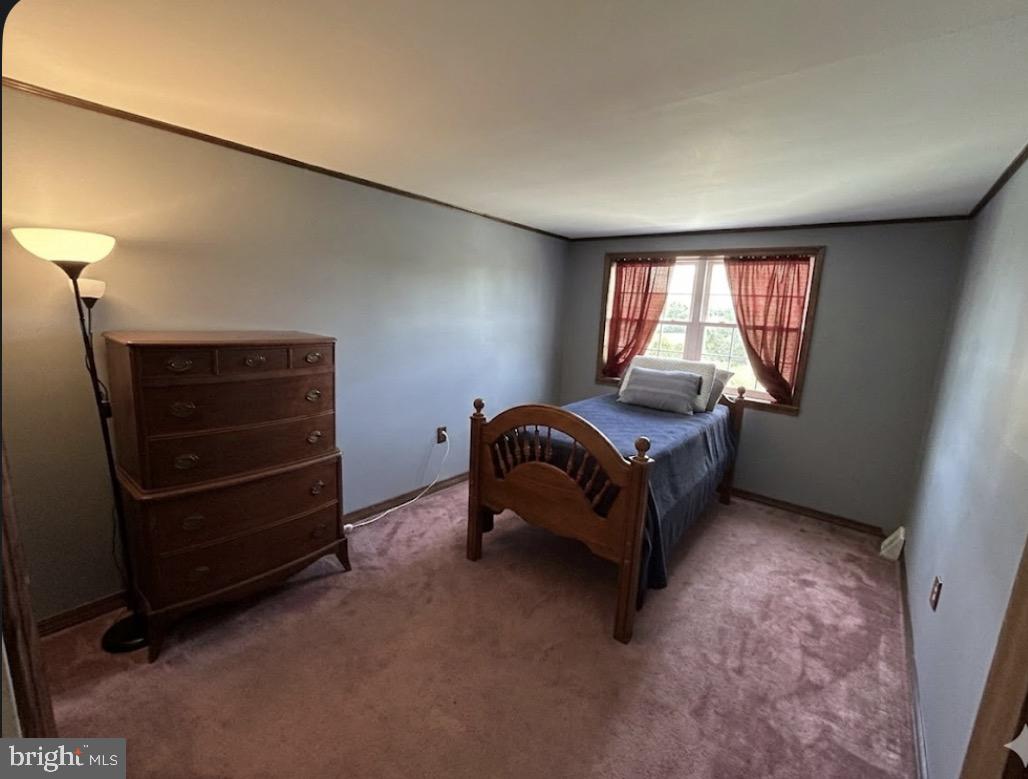 3243 Morrell Avenue Philadelphia, PA 19114 - Photo 24 of 28 a room with a bed and a window
