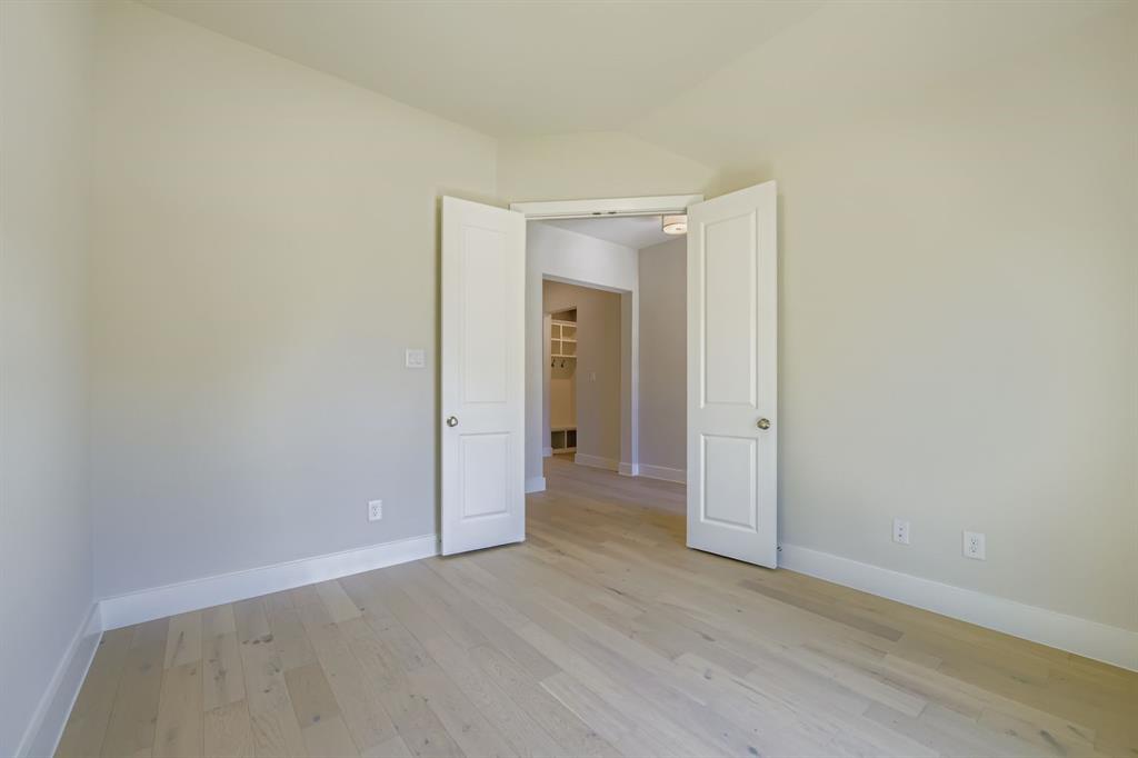 158 Sandie Drive Rhome, TX 76078 - Photo 12 of 25 a view of a hallway with wooden floor