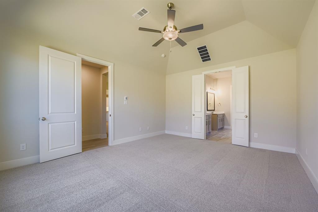 158 Sandie Drive Rhome, TX 76078 - Photo 15 of 25 an empty room and chandelier fan in a room