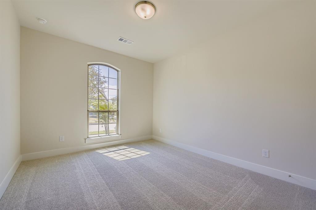 158 Sandie Drive Rhome, TX 76078 - Photo 20 of 25 an empty room with windows