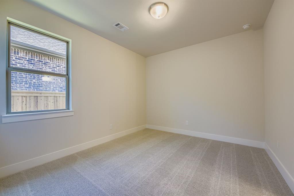 158 Sandie Drive Rhome, TX 76078 - Photo 21 of 25 an empty room with a window