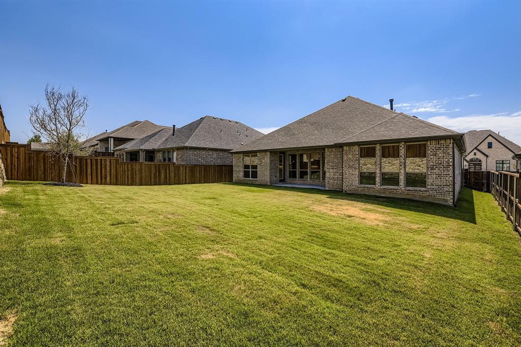 158 Sandie Drive Rhome, TX 76078 - Photo 25 of 25 a front view of a house with a yard