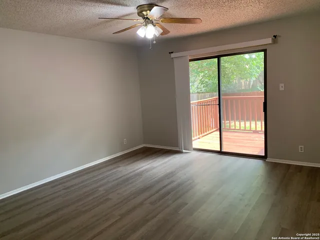 a bathroom with a sink toilet a mirror and shower
