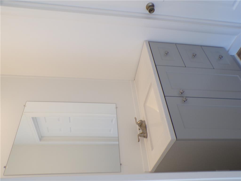 7877 Gun Club Road New Tripoli, PA 18066 - Photo 14 of 19 A well-appointed vanity with ample storage and a sleek counter offers functional elegance.