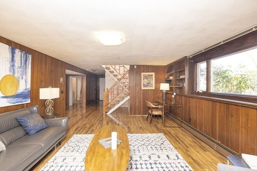 6 Nelson Drive Brookline, MA 02467 - Photo 32 of 42 a living room with furniture and a window