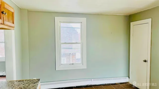 a view of a room that has a window in it