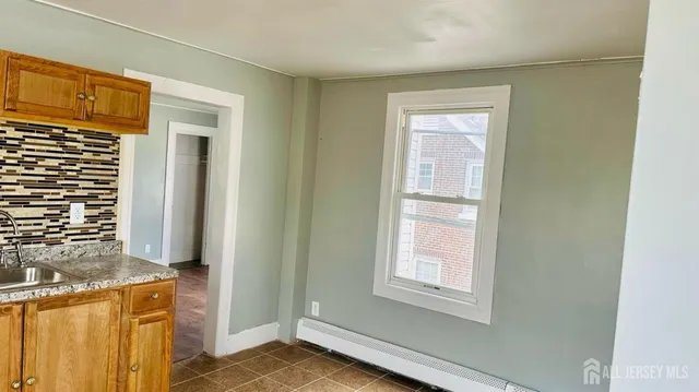 a view of a room that has a window in it