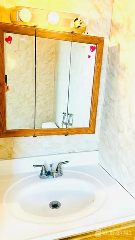 a bathroom with a sink and a bathtub