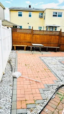 a view of a balcony with wooden floor