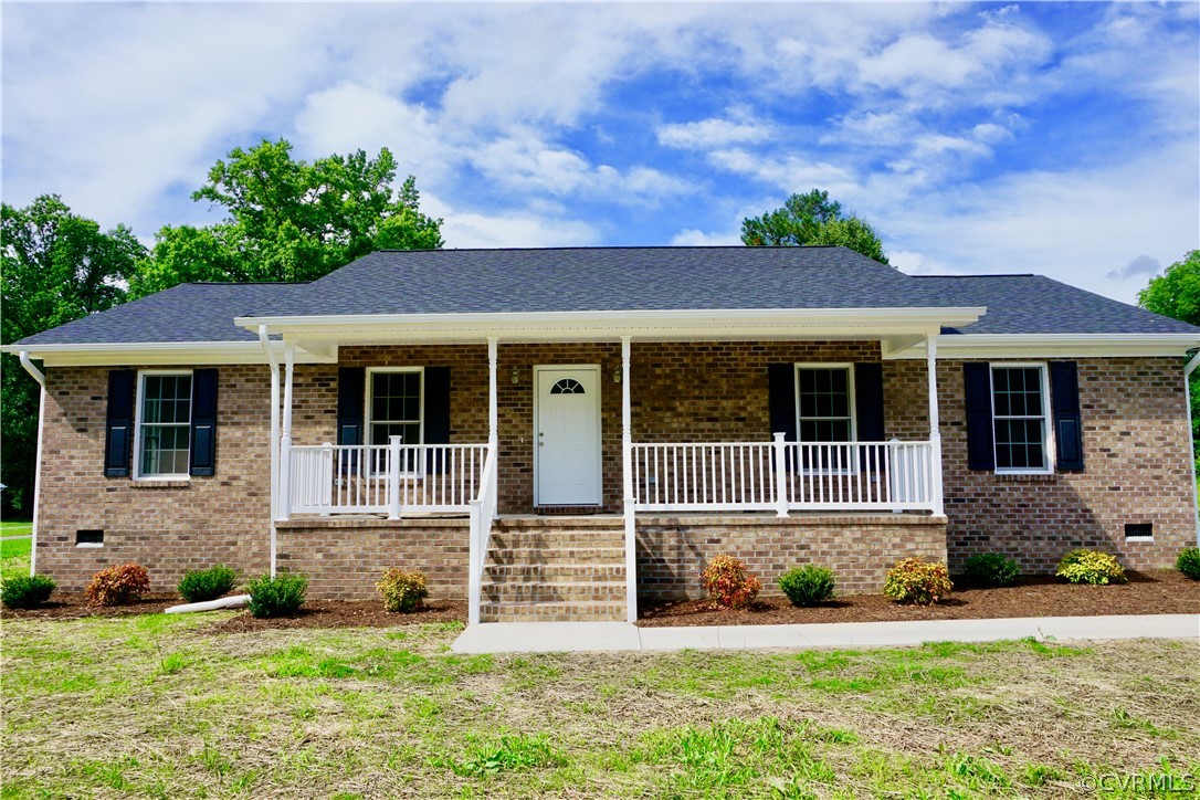 front view of a house with a yard