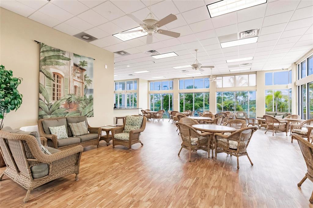 8409 Placida Road, Unit 308 Placida, FL 33946 - Photo 43 of 56 a living room with lots of furniture and a large window