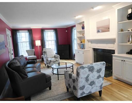 119 Robinson Road Boxborough, MA 01719 - Photo 13 of 27 a living room with furniture fireplace and window