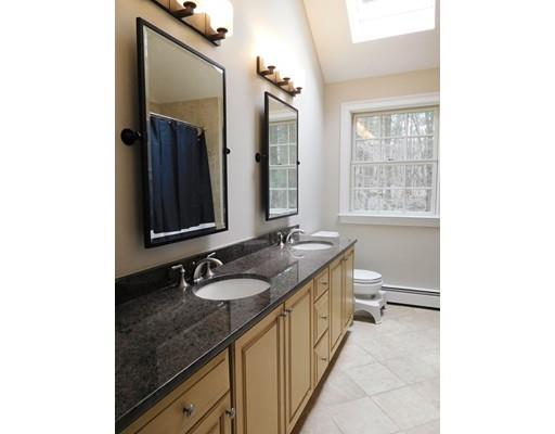 119 Robinson Road Boxborough, MA 01719 - Photo 16 of 27 a bathroom with a granite countertop sink and a mirror