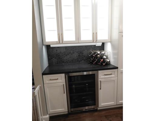 119 Robinson Road Boxborough, MA 01719 - Photo 5 of 27 a kitchen with a sink and cabinets