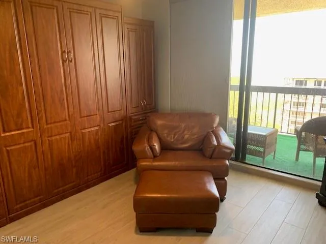 a living room with furniture and a gate