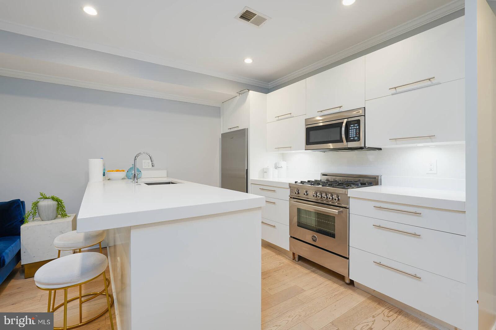 1461 Chapin Street Northwest Washington, DC 20009 - Photo 57 of 67 Sleek modern kitchen with stylish finishes.