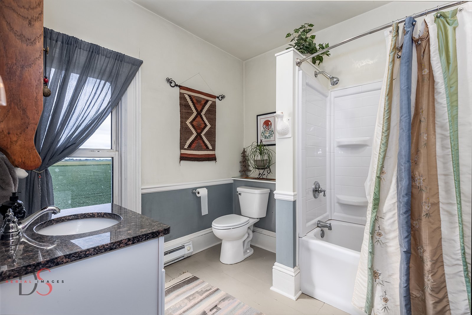 2117 North 23rd Road Marseilles, IL 61341 - Photo 26 of 33 a bathroom with a sink toilet and shower