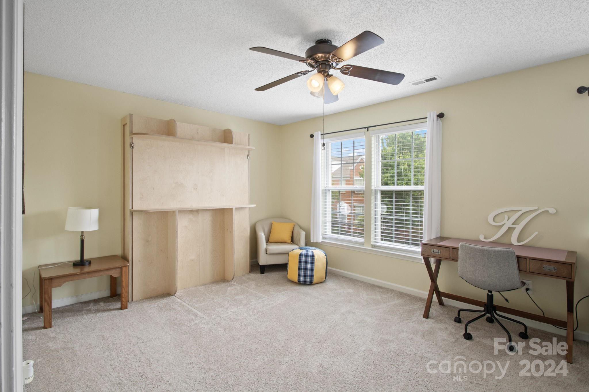 6031 Creft Circle Indian Trail, NC 28079 - Photo 11 of 28 a living room with furniture and a window