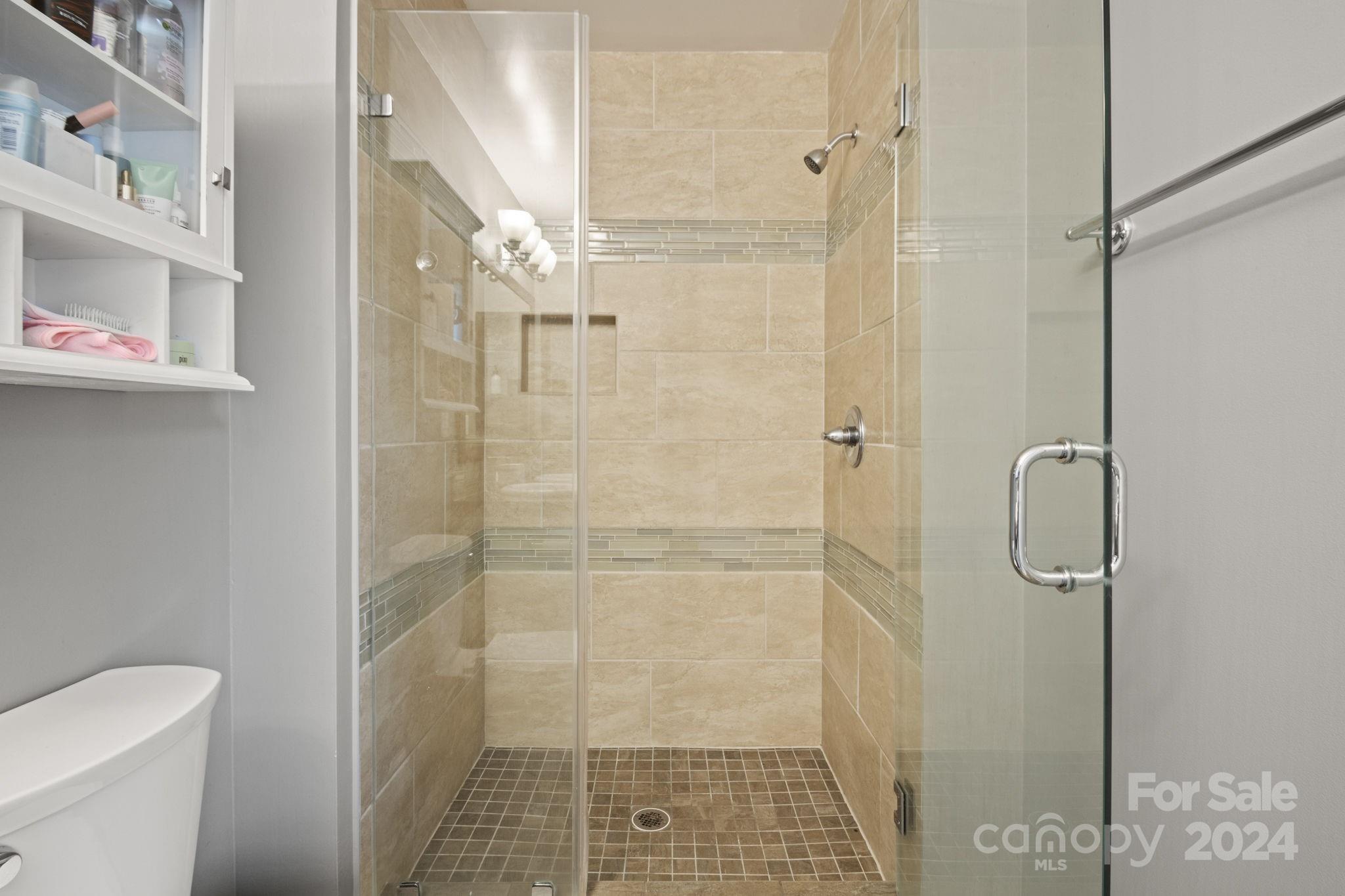 6031 Creft Circle Indian Trail, NC 28079 - Photo 18 of 28 a bathroom with a shower