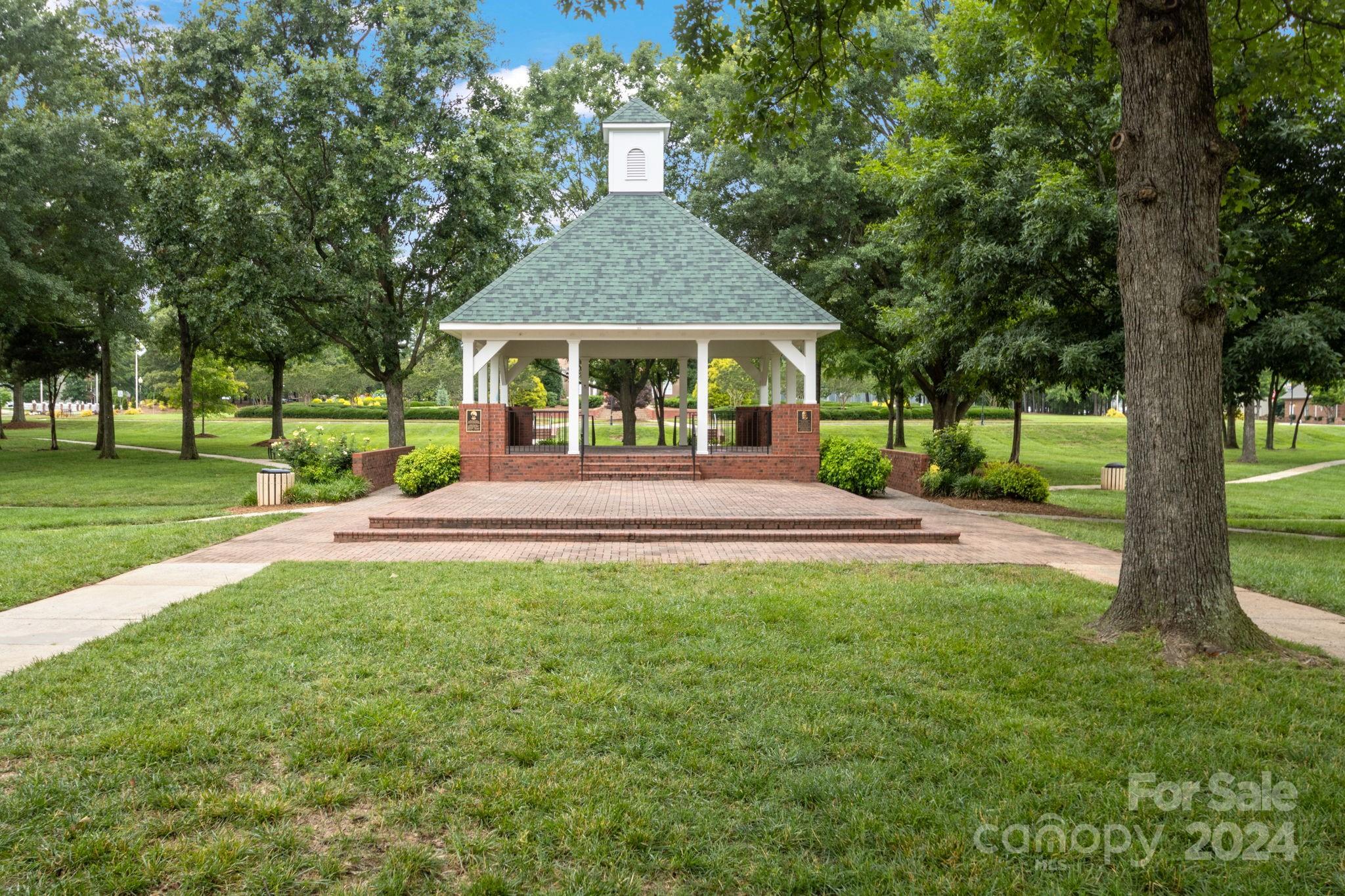 6031 Creft Circle Indian Trail, NC 28079 - Photo 22 of 28 a front view of a house with a yard