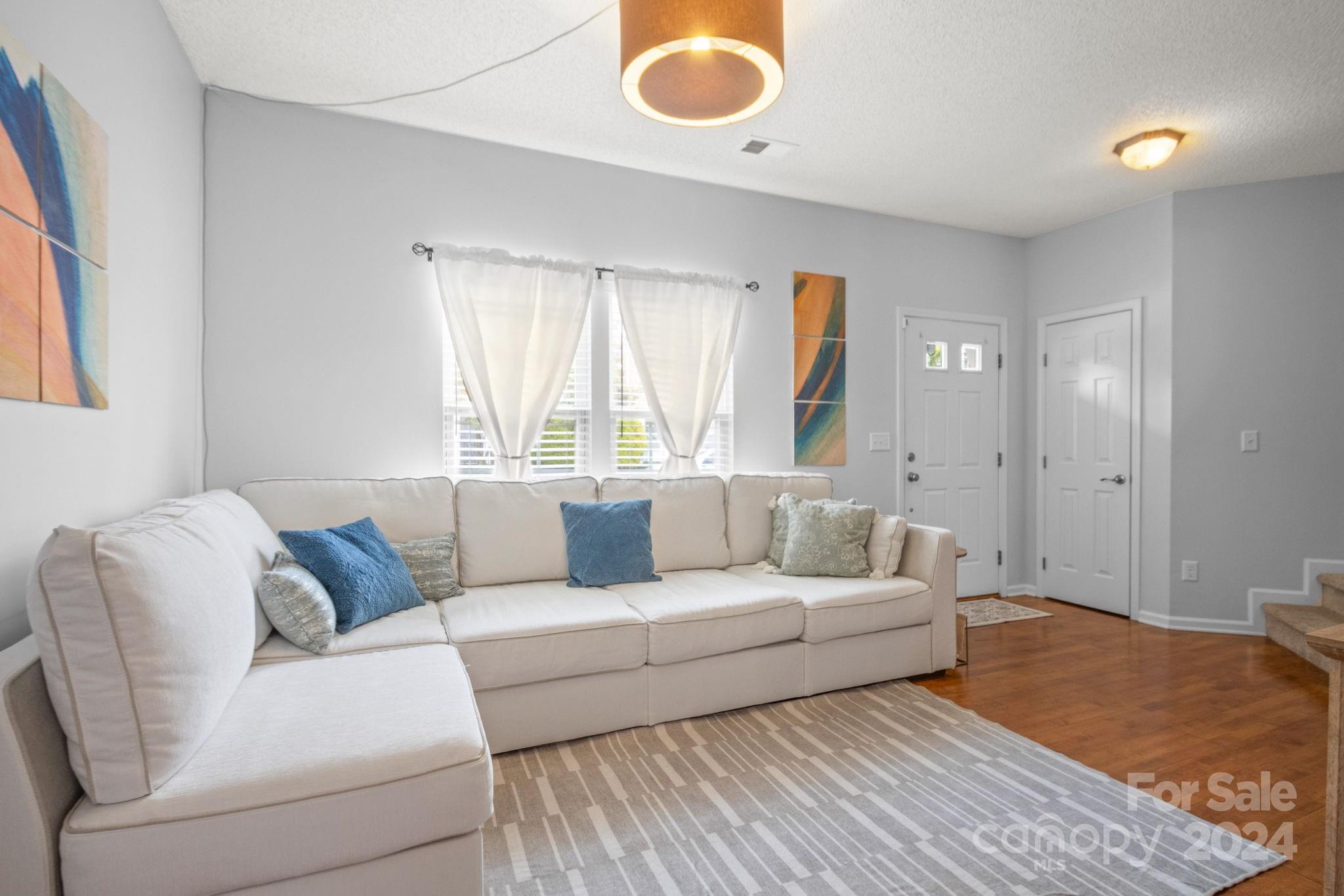 6031 Creft Circle Indian Trail, NC 28079 - Photo 5 of 28 a living room with furniture and a window