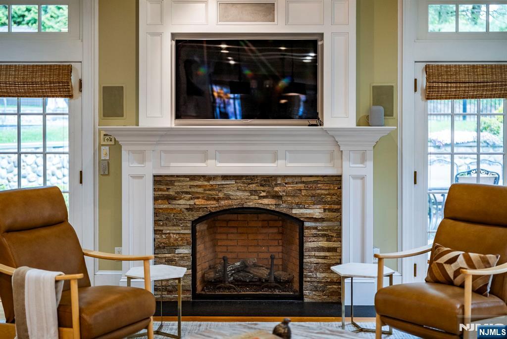 203 Heights Road Ridgewood, NJ 07450 - Photo 9 of 41 a living room with furniture and a fireplace