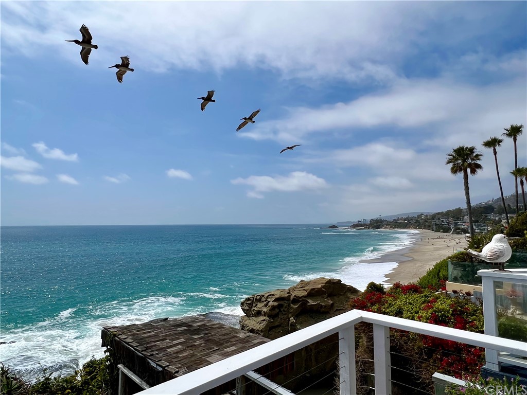 a view of a backyard with sitting area