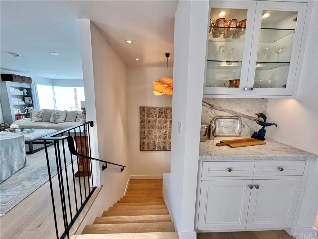 7 Camel Point Drive Laguna Beach, CA 92651 - Photo 29 of 48 a view of a hallway with furniture and windows