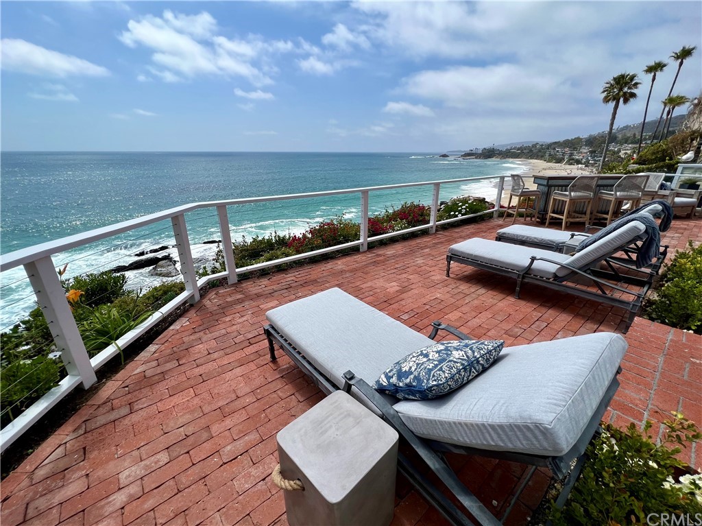 7 Camel Point Drive Laguna Beach, CA 92651 - Photo 44 of 48 an outdoor sitting area with furniture