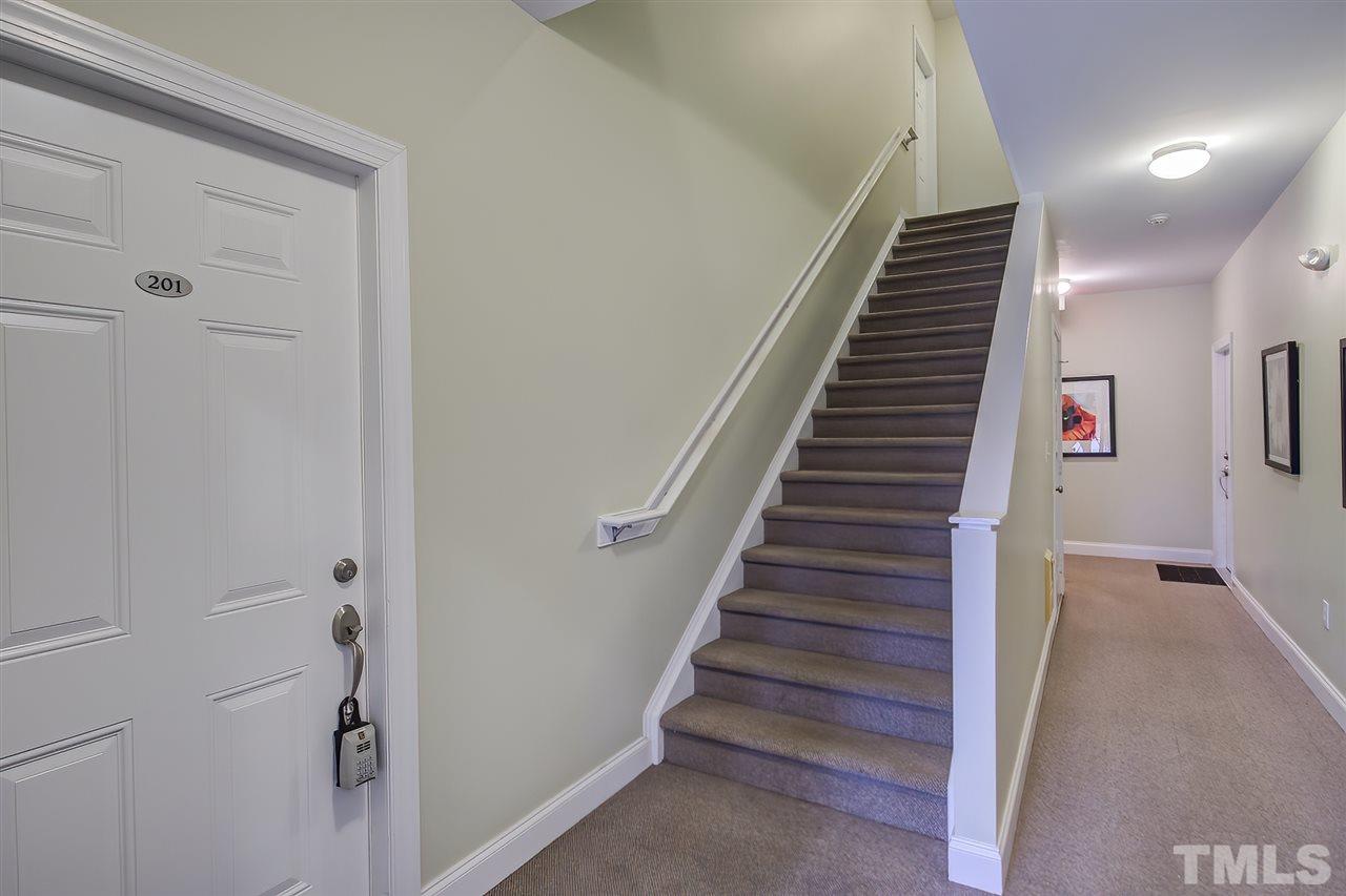 201 West Savannah Ridge Road, Unit 201 Holly Springs, NC 27540 - Photo 3 of 30 a view of entryway and gallery