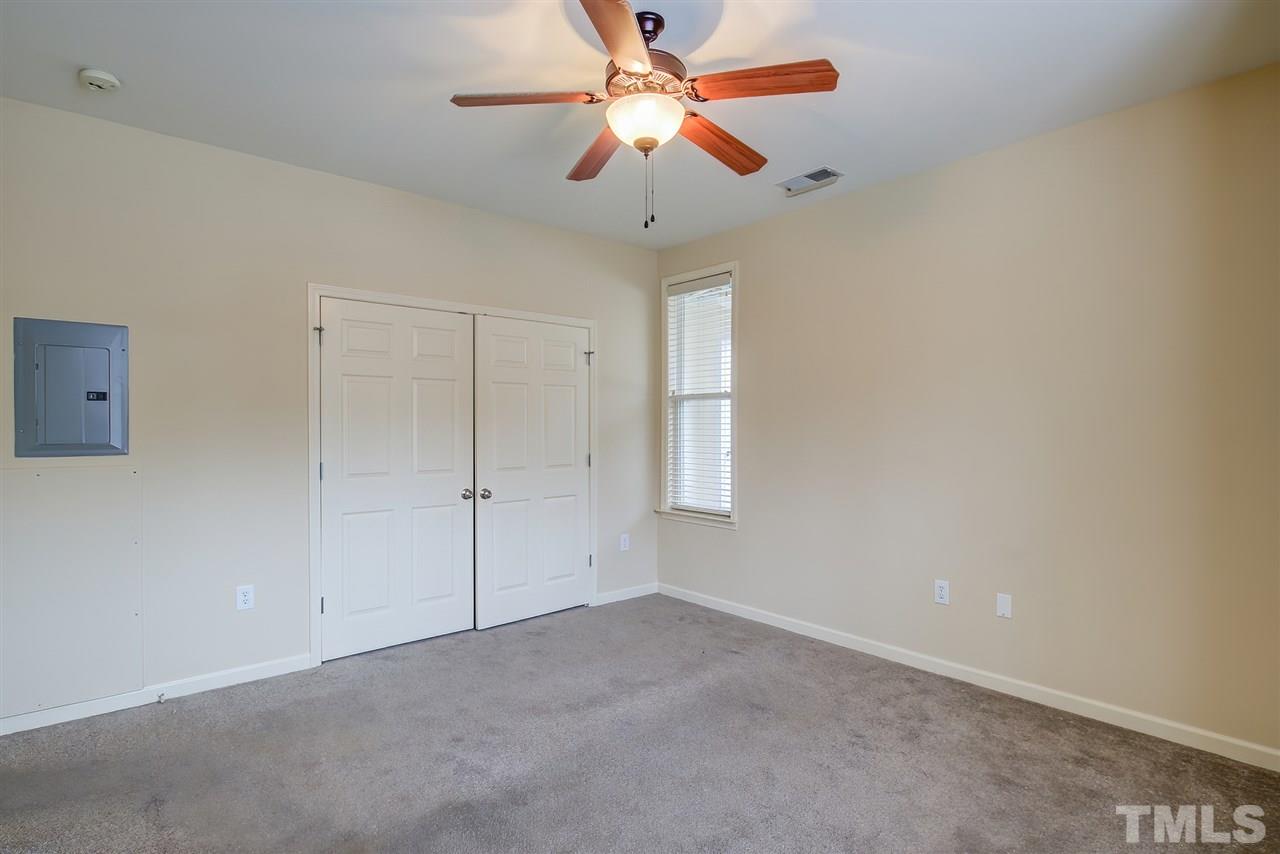 201 West Savannah Ridge Road, Unit 201 Holly Springs, NC 27540 - Photo 21 of 30 a view of an empty room