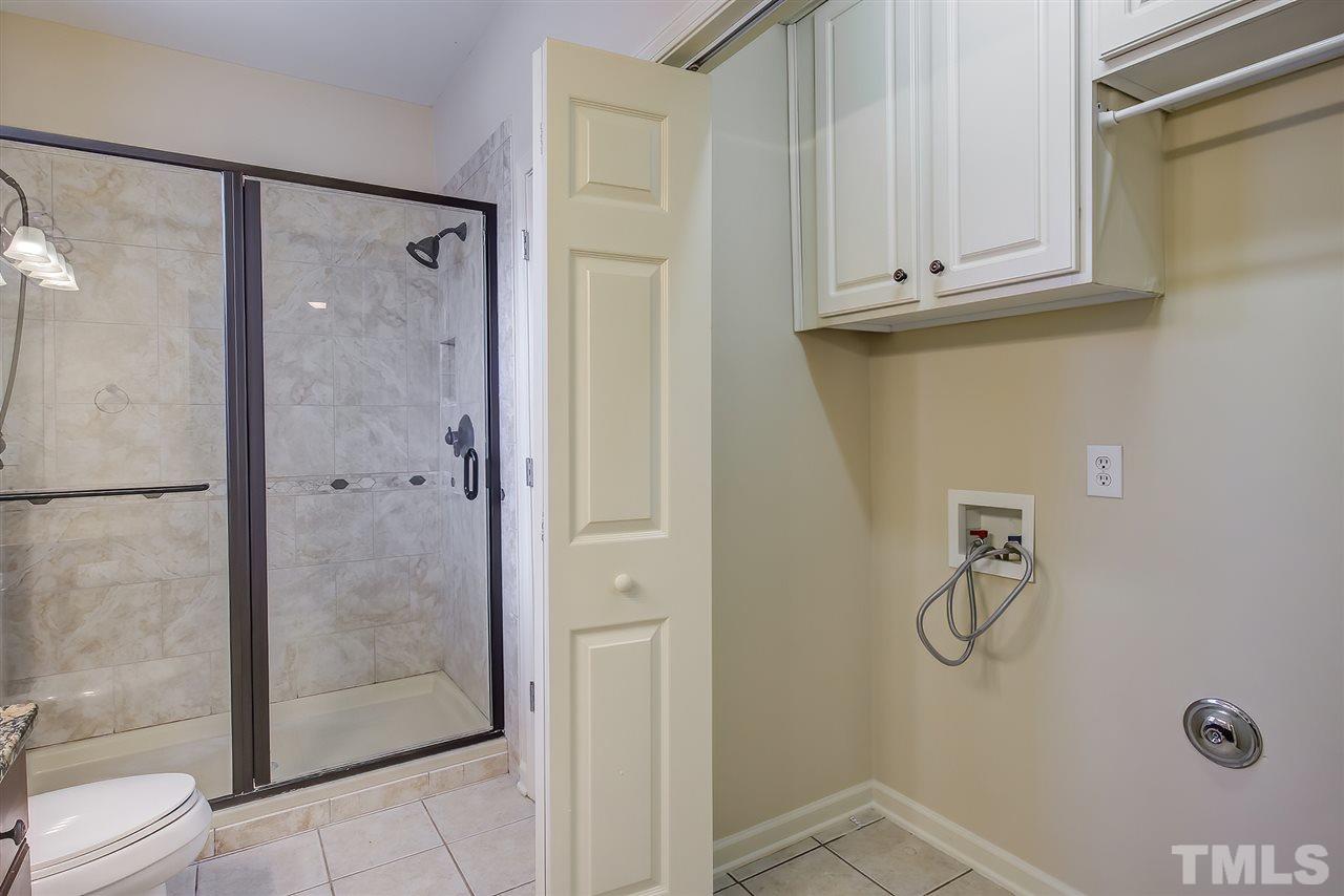 201 West Savannah Ridge Road, Unit 201 Holly Springs, NC 27540 - Photo 26 of 30 a bathroom with a shower