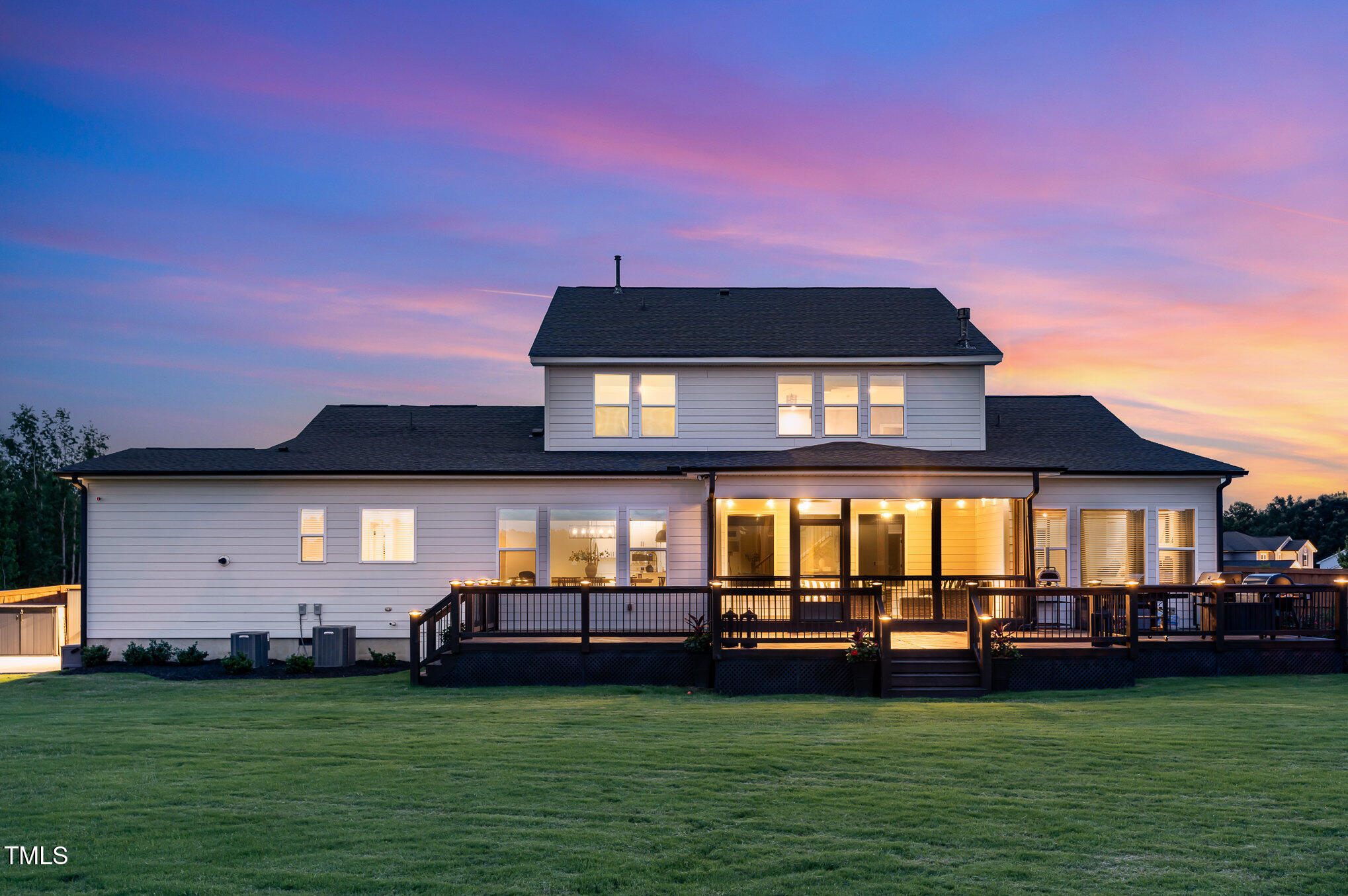4404 Buckley Drive Apex, NC 27539 - Photo 65 of 79 a front view of a house with a garden