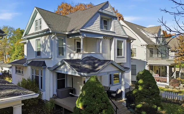 front view of a house with a yard