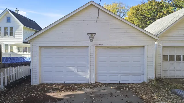 a view of house with garage